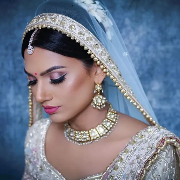 Engagement look in white and silver with a light veil