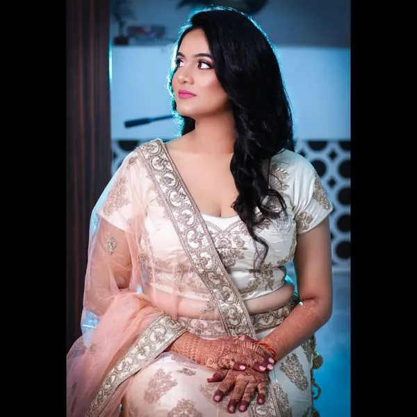 Party makeup with a white and pink saree and soft evening eyes